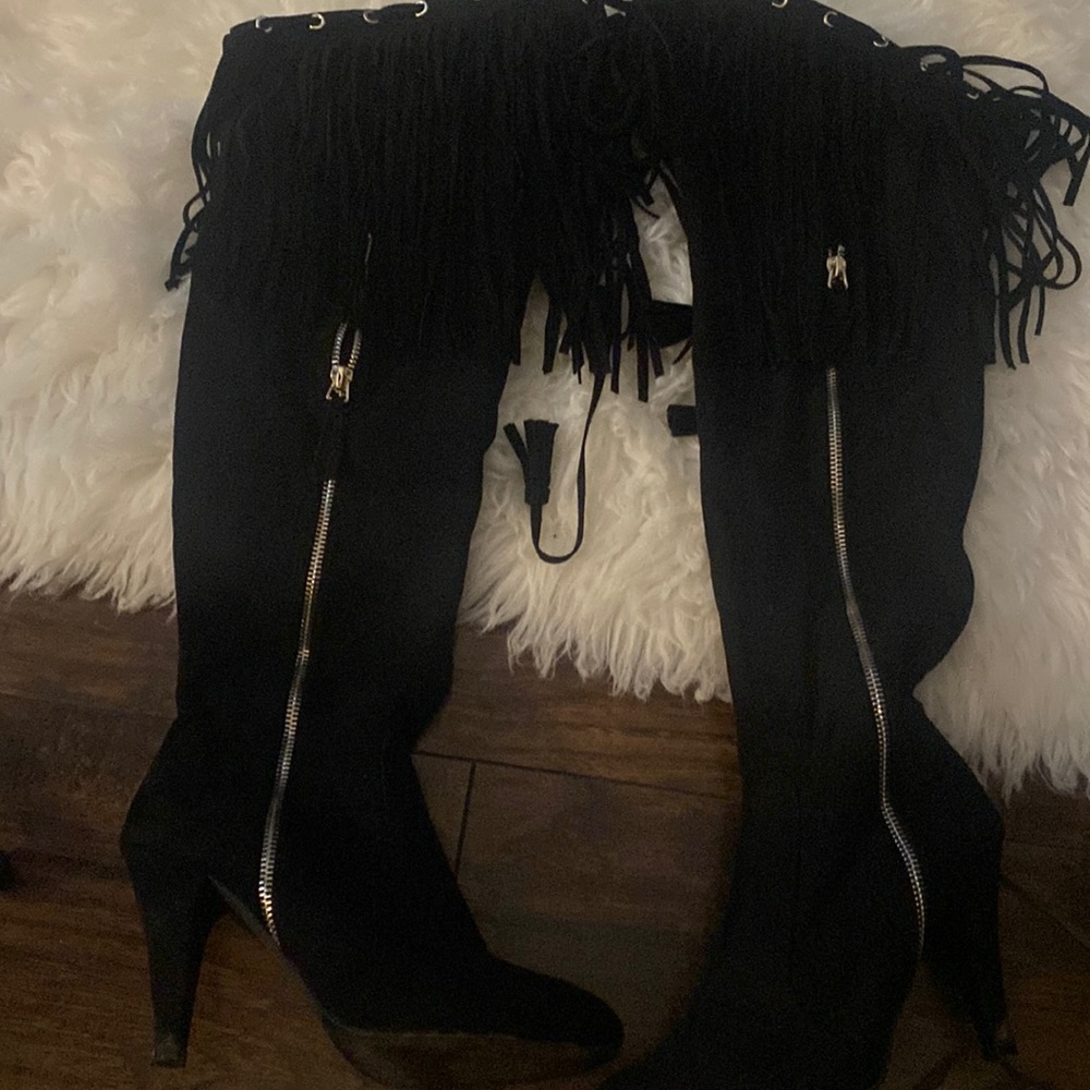 Thigh high fringe boots gently worn once to tight around legs for me